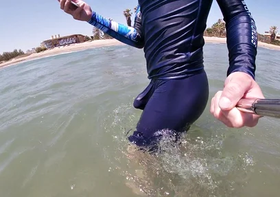 Surfer Gets Erect in His Lycra for the Pleasure of the People