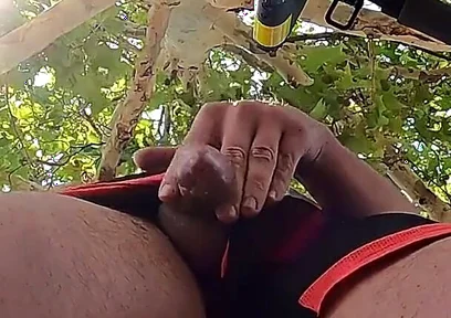 Bulging Young Man Moans with Pleasure in Park Jerking off a Summer Handjob