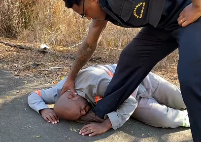 Vigilante Humiliating the Worker
