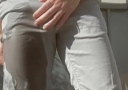Jules Wets His Grey Pants and Exposes His Semi-hard Cock Through His Trousers