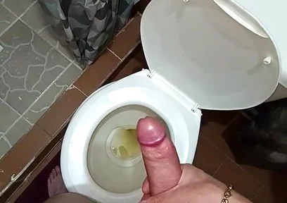 Two Shots of Cum on the Pee in the Bathroom
