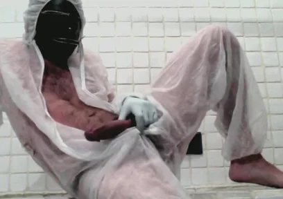 Masked Femboy in Suit Pees Itself and Cums