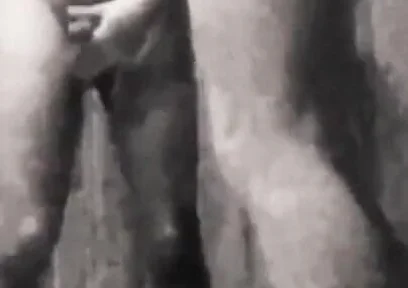 A Boy Is Discussing with His Horny Stepdad in the Pool's Public Showers When Stepdaddy Suddenly Pees on Him