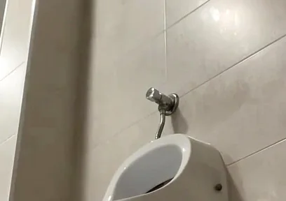 Amateur Twink Boy and Older Guy Caught Having Risky Fun in the Pool's Public Toilets