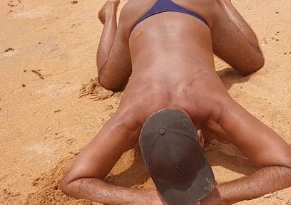 Ladysmith Doing a Striptease on the Beach Showing off Her Tanned Ass with Sexy Mark