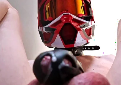 A Puppy Rides a Dildo Wearing a Helmet.