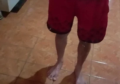 Boy in Red Shorts