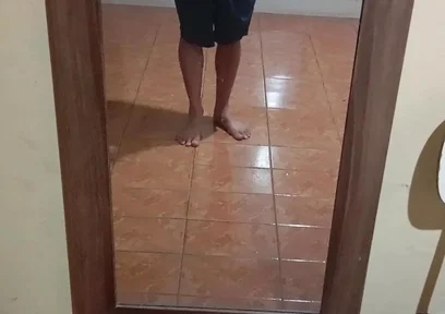 Boy in Shorts in the Mirror