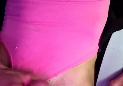 Crossdresser Michelle Wearing Pink Bodysuit While Playing with Cock