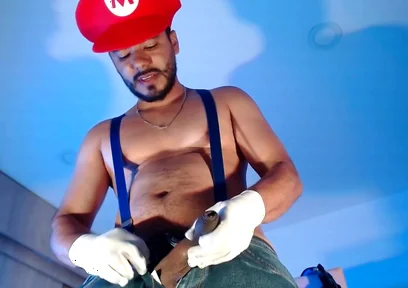 Dressed as Mario Bros Playing with His Plumbing Tool