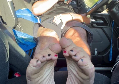 Coloured Toes and Soles of a Trucker