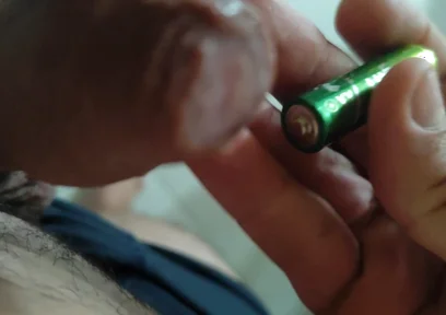 Inserting Electric Batteries Inside the Wet Dick