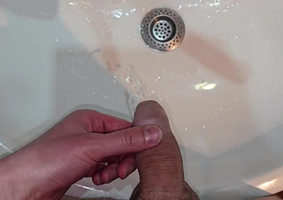 Pissing to the Bathroom Sink