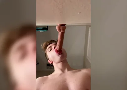 Cock Hungry Twink Slobbers on Giant Dildo!