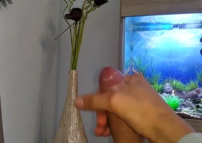 Hot Young Guy Wanks His Nice Big Cock Until He Cums Slowly in Front of the Aquarium