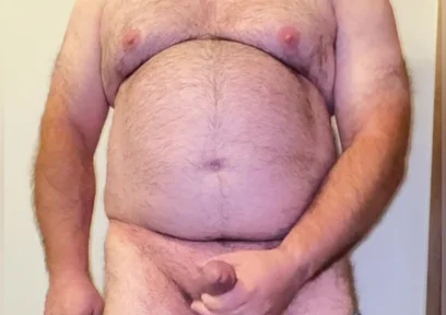 Anal Steve in His Blue Thong Showing off His Bear Body and Cock, with a Cock Ring on and Showing His Massive Butt Plug