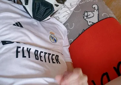 The Guy Is Wearing a Soccer Uniform and Mxhelmet with a Morning Cum