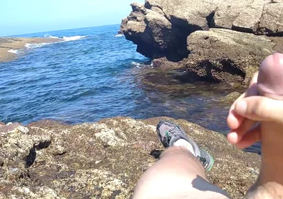 Jerking off a Big Hard Dick Overlooking the Sea in the Beach Cove Until He Cums