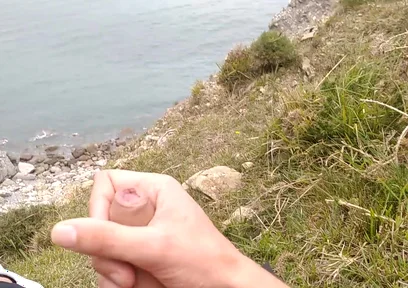 Big Beautiful Big Fat Cock Gets Handjob on the Beach with Gorgeous Sea Views
