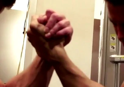 Amateur Fitness Guys Arm Wrestle in the Gym