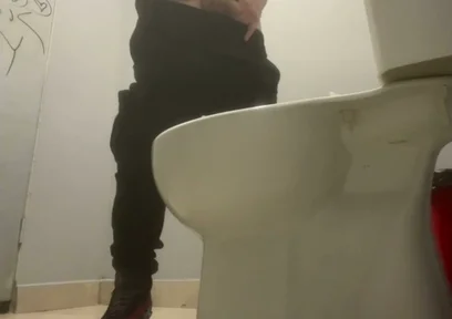 Amateur Friends Pissing Together in the Club's Toilets
