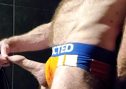 Muscle Bear Showing off His Uncut Cock
