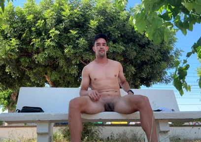 Hot Stud Fully Naked on Public Park Bench Gets Caught