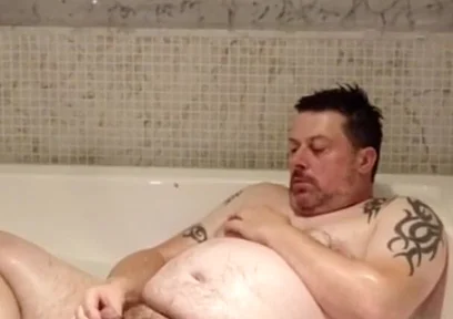 In the Big Bath Having a Wank