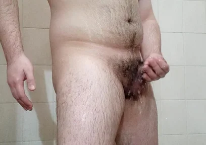 Muscular Jock Relaxes in the Shower