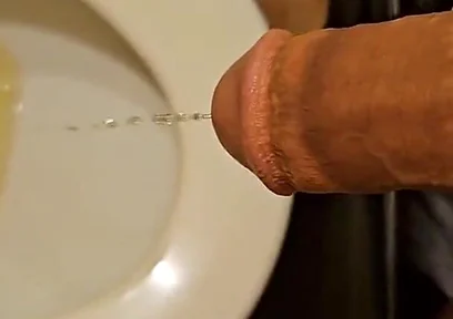 Shaved Cock Pissing