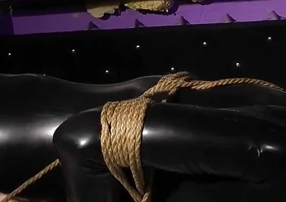 Roped in Latex: Zeus Struggles to Break Free