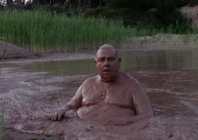 Mud Bath in Deep Quarry Mud Pond