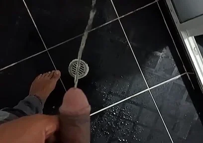 Urinating in Dark Jeans