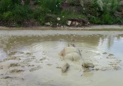 Me Playing in Deep Light Mud