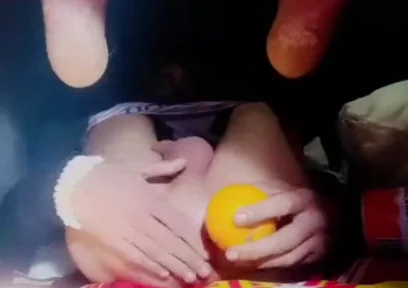 A Young Man Stuffs a Crystal Ball and an Orange up His Tight Ass.