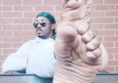 I Expose My Feet and I Touch Them