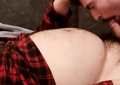 Sucking off a Hairy Bear on the Sofa