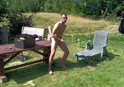 Jerking off While Hanging Out the Laundry