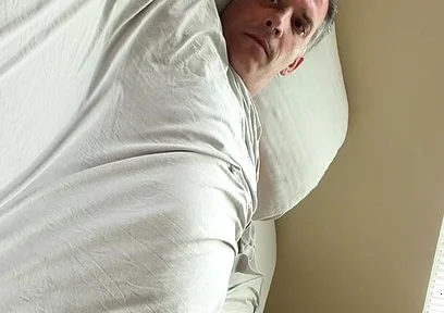 Duke Silver Plays the Trombone in Bed