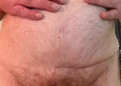Coach Karl Rubs His Belly 6811