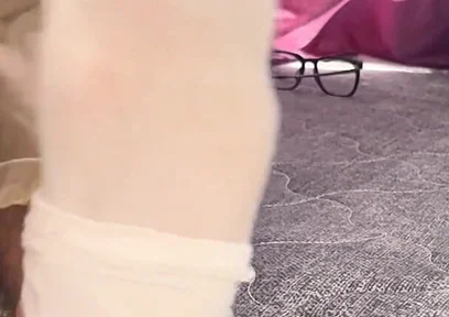 A University Rests Her Feet on Her Face so That the Adorers