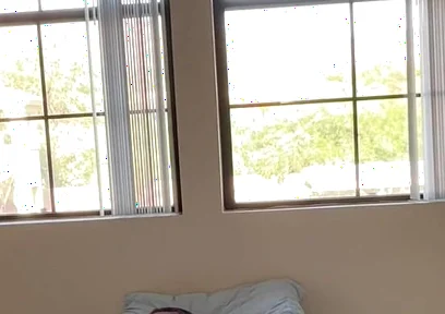 Watching Him Drift Between Shirts and Shorts