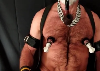 Stepdad Playing with Strap-on While Smoking His Pipe