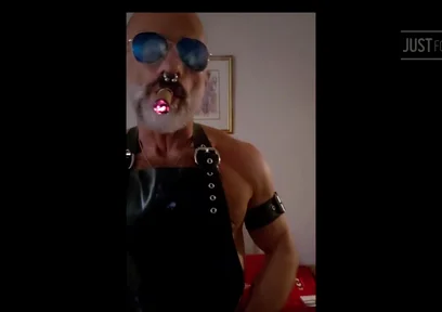 Stepdad lighting his Cigar in rubber apron