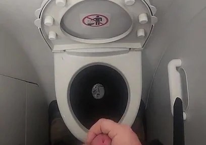 Airplane Bathroom Jerk and Cum.