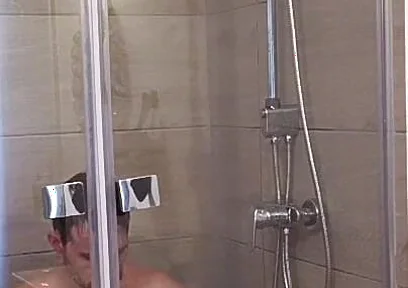 After a Full Day on the Road Wet Solo in the Hotel Shower