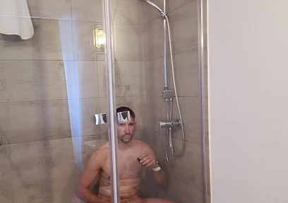 After a Full Day on the Road Wet Solo in the Hotel Shower