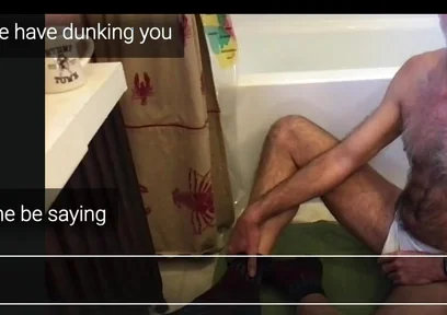 Guy Getting Dunked in a Tub.
