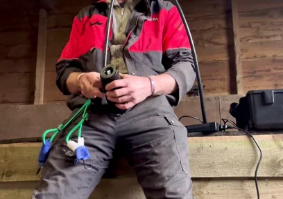 Farmer Smokes and Milks Himself with the Milking Machine
