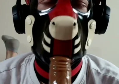 Latex Pet Sucks His Rubber Bone. Watch the Full on My Fancentro